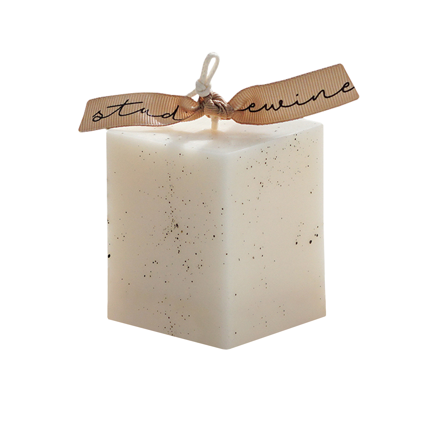 a dotted white square pillar candle with beige bluewine studio ribbon